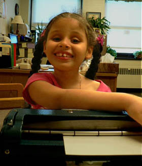 student using a braille writer