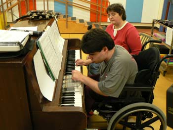 joey playing piano during music therapy