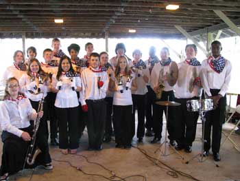 Students playing handbells and other instruments