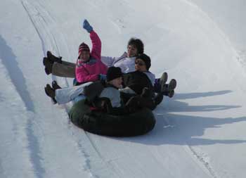 Students snow tubing